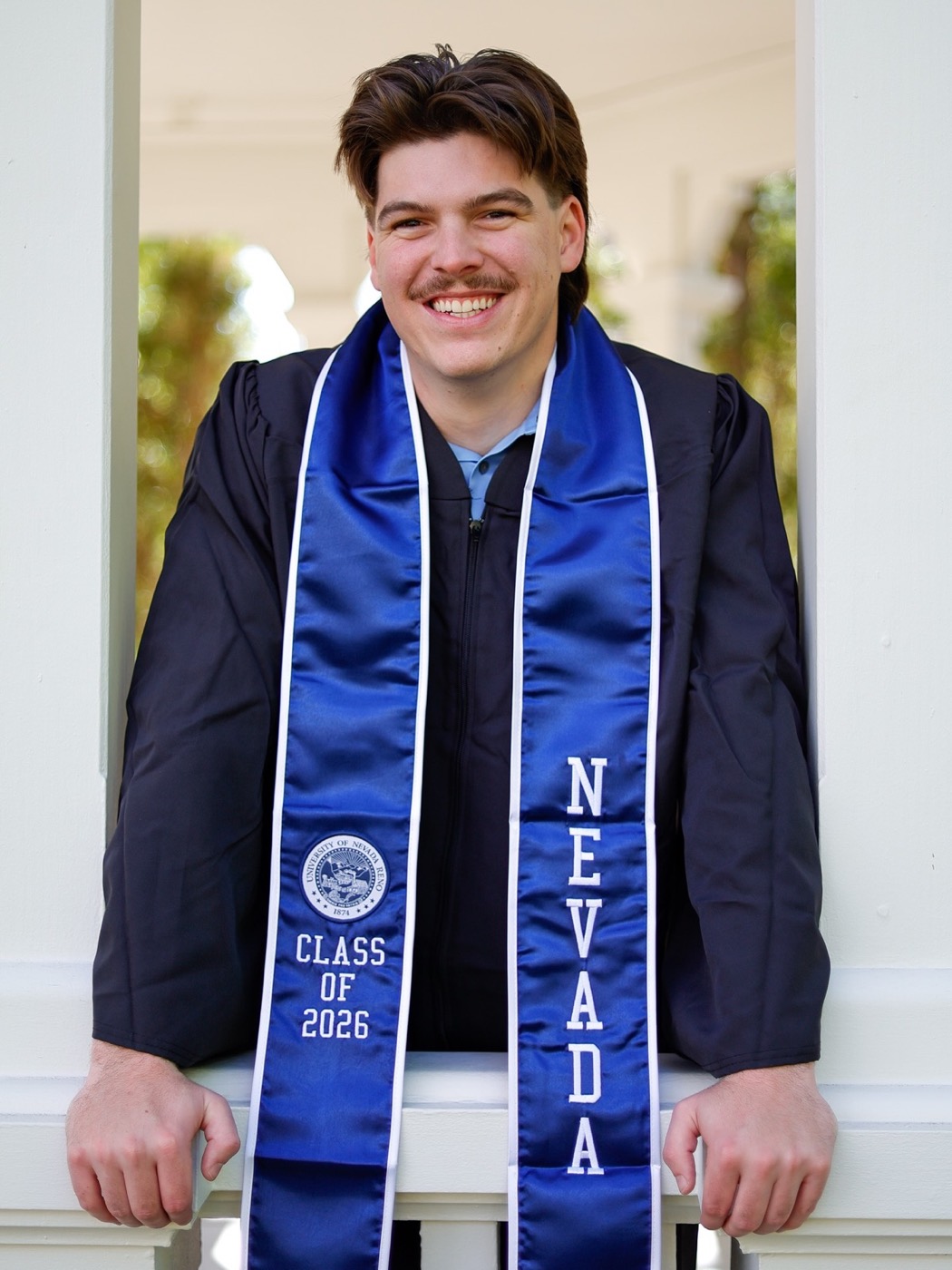 Sean O'Leary in his University of Nevada, Reno graduation stole